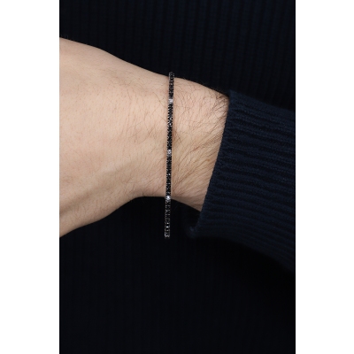 Bracelet tennis en or blanc 18 carats avec diamants noirs et blancs et griffes brunies