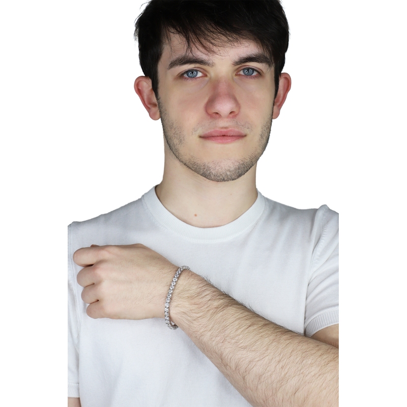 Bracelet tennis griffé en or blanc 18k avec diamants Bracelet tennis griffé en or blanc 18k avec diamants