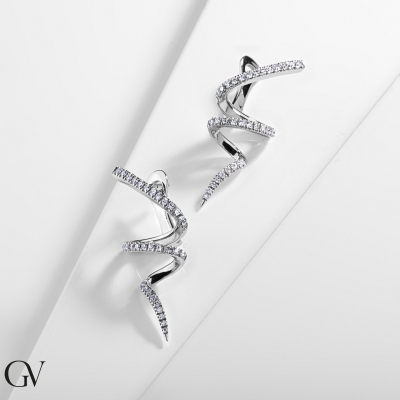 Boucles d'oreilles en spirale en or blanc 18k avec diamant