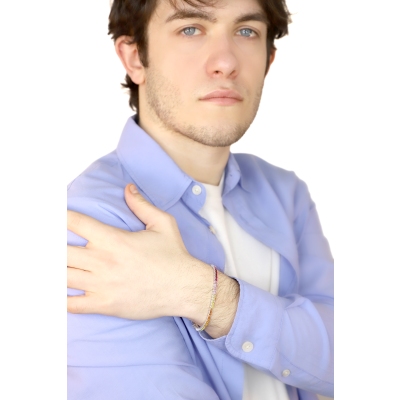 Bracelet Rivière en or blanc 18 carats avec saphirs multicolores.