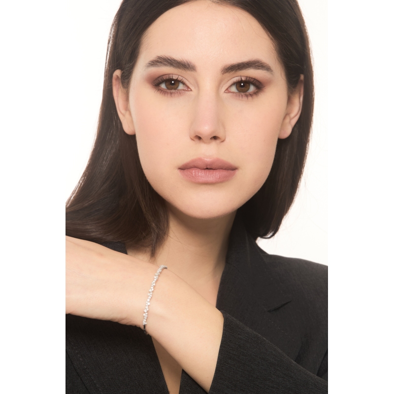 Bracelet en or blanc 18 carats motifs feuilles et diamants