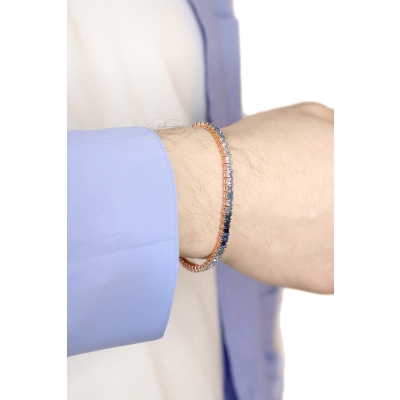 Bracelet tennis en fil d'or rose 18k avec saphirs multicolores bleus 