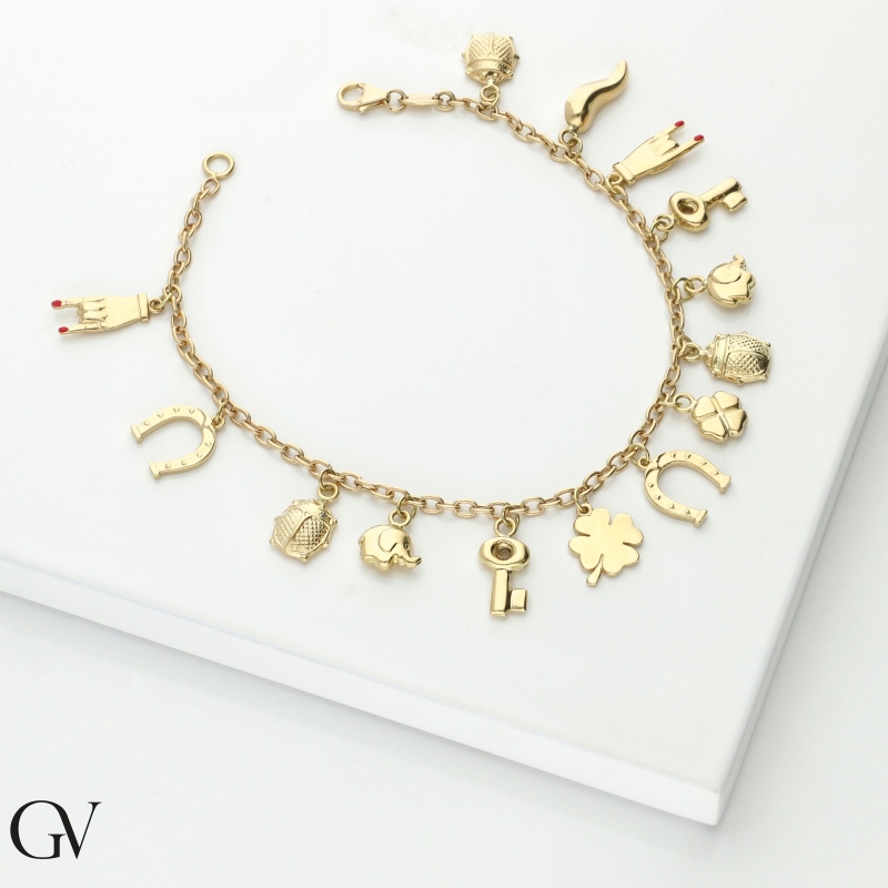 Bracelet porte-bonheur en or jaune 18k orné de charms Bracelet porte-bonheur en or jaune 18k orné de charms