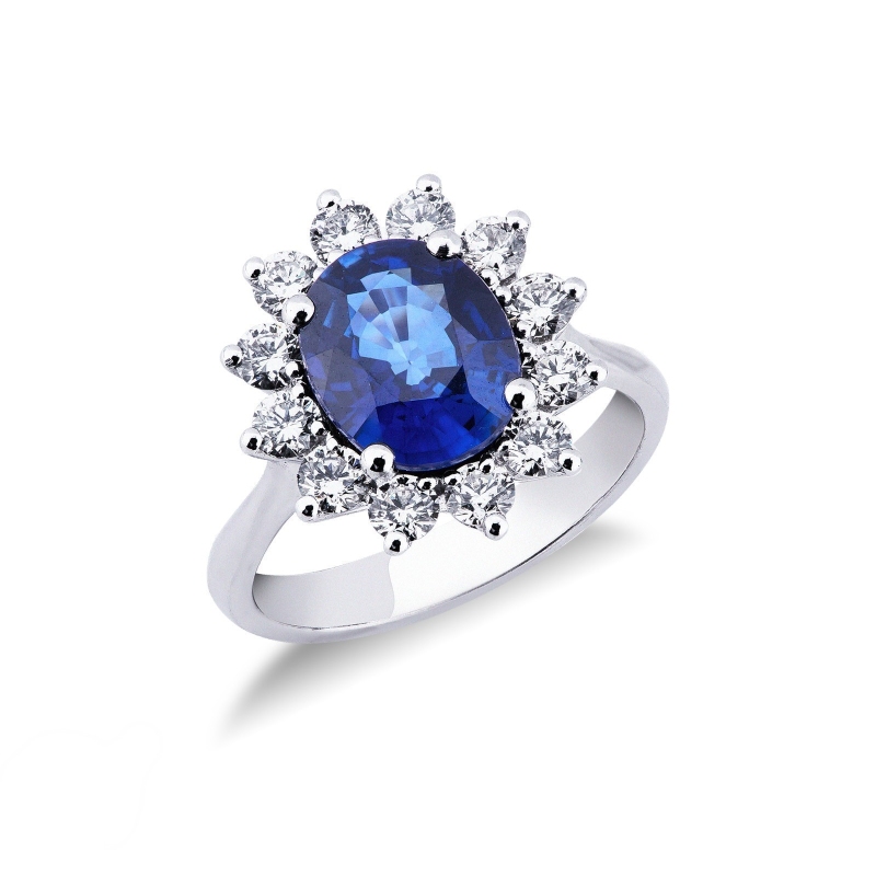 Bague halo classique en or blanc 18k avec saphir bleu et diamants