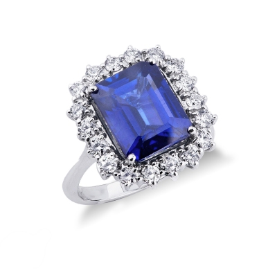 Bague en or blanc 18k avec saphir bleu entouré de diamants