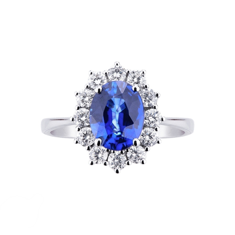 Bague halo en or blanc 18k avec saphir bleu  9x7 mm Bague halo en or blanc 18k avec saphir bleu  9x7 mm