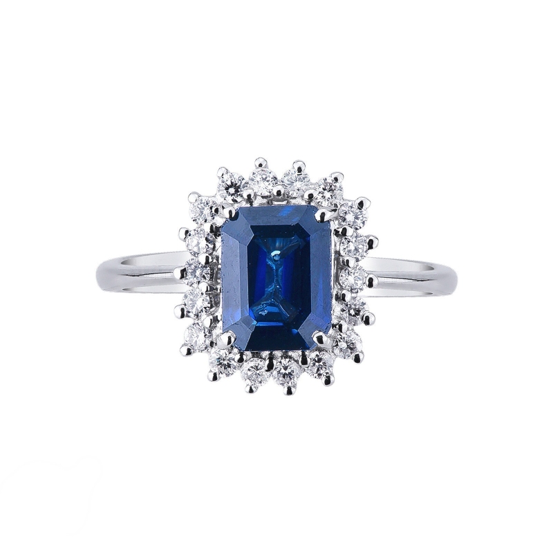 Bague halo en or blanc 18k avec un saphir bleu