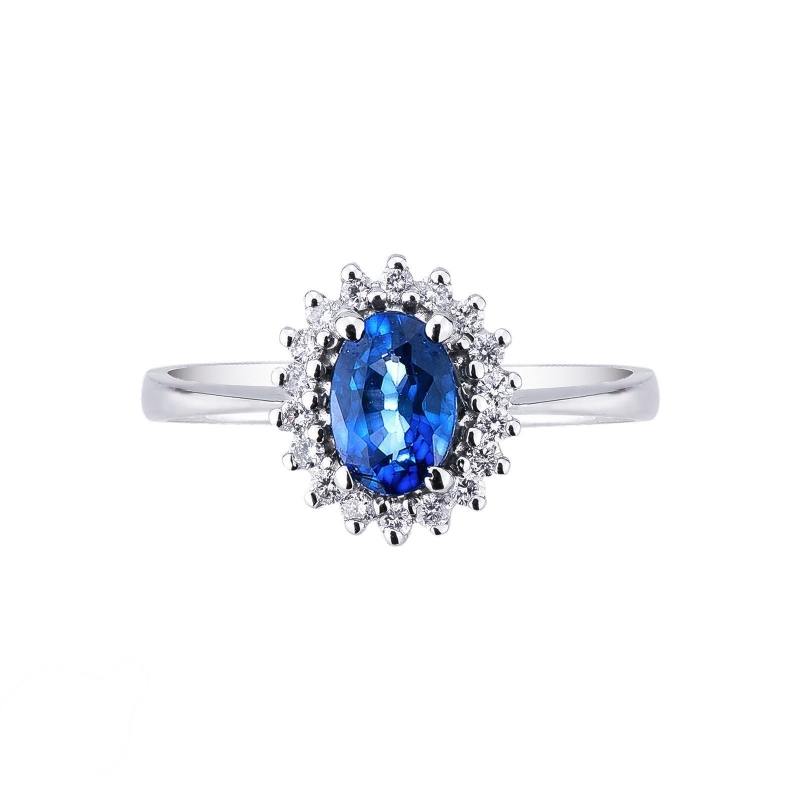 Bague en or blanc 18k avec diamants et saphir bleu ovale Bague en or blanc 18k avec diamants et saphir bleu ovale