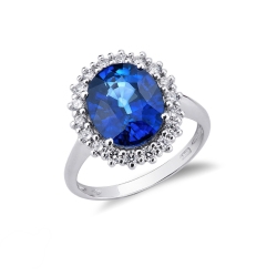 Bague en or blanc 18k avec saphir ovale et diamants