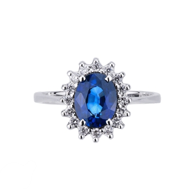 Bague or blanc 18k saphir bleu central halo de diamants