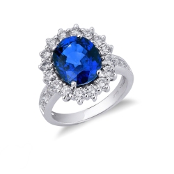 Bague halo avec saphir bleu ovale et diamants