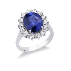 Bague halo en or blanc 18 carats avec diamants et saphir bleu central