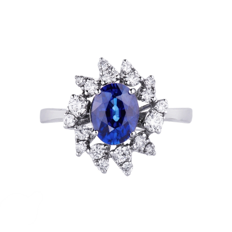 Bague halo en or blanc 18k saphir bleu et diamants