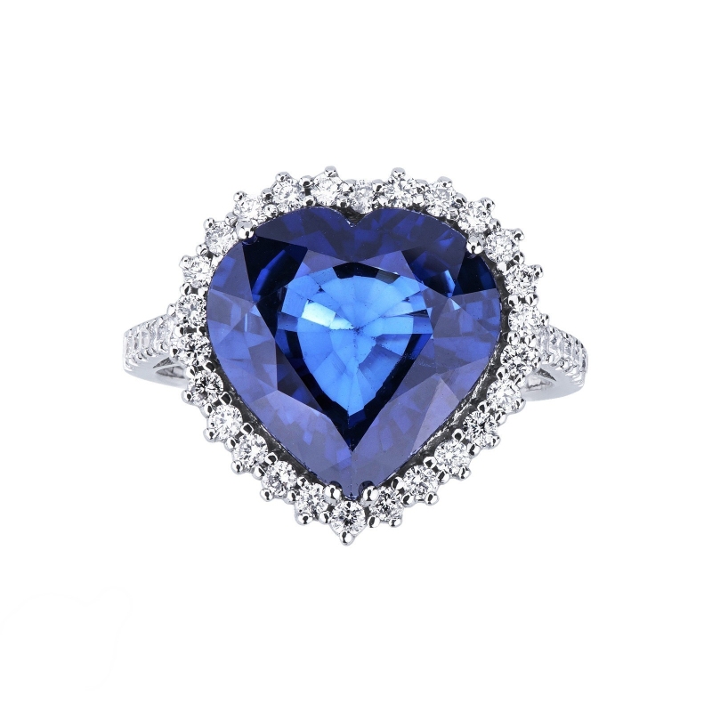 Bague halo en or blanc 18 carats avec saphir bleu Bague halo en or blanc 18 carats avec saphir bleu