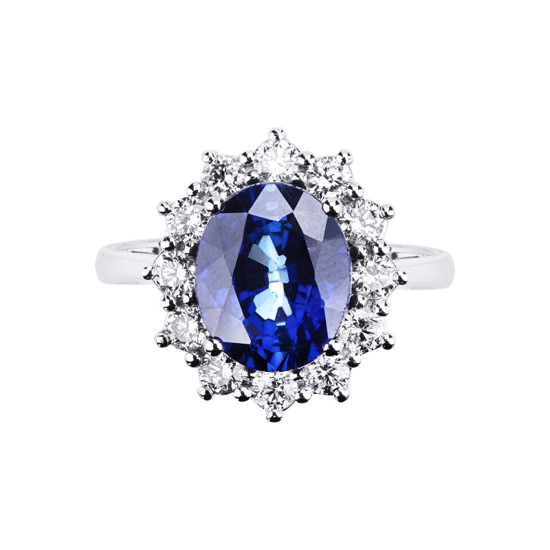 Bague halo en or blanc 18 carats avec saphir bleu ovale et diamants