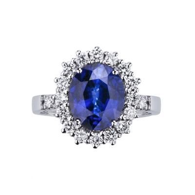 Bague or blanc avec saphir bleu et diamants