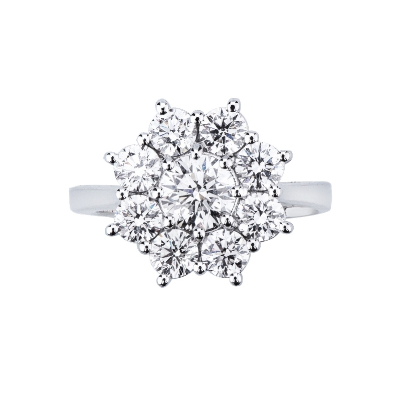 Bague halo fleur en or blanc 750 avec diamant central