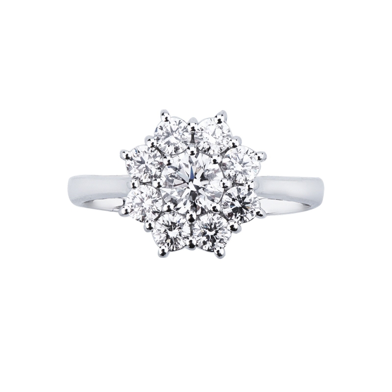 Bague halo en forme de fleur avec diamant central 0.50 ct or blanc 18k Bague halo en forme de fleur avec diamant central 0.50 ct or blanc 18k