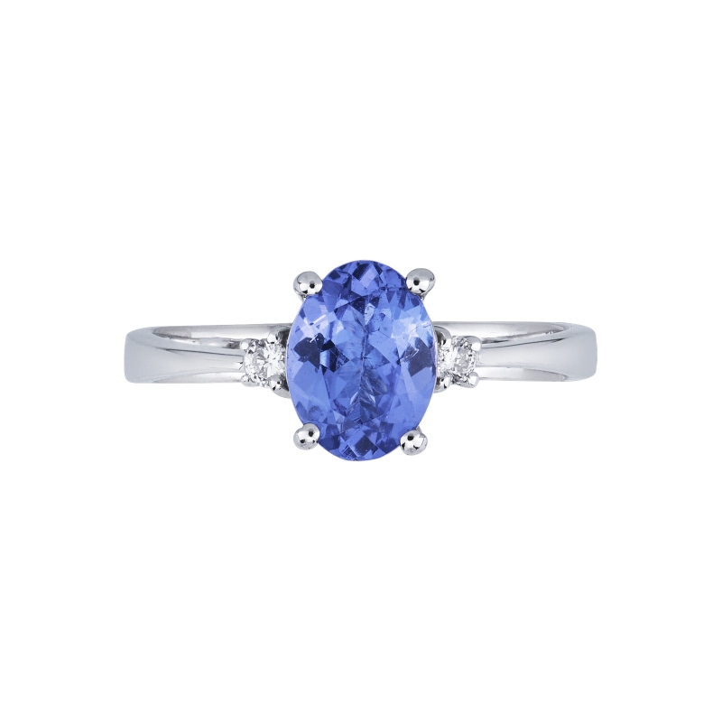 Bague en or blanc 18 carats avec 2 diamants et une tanzanite au centre Bague en or blanc 18 carats avec 2 diamants et une tanzanite au centre