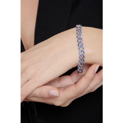 Bracelet maille gourmette en or blanc 18k avec saphirs bleus