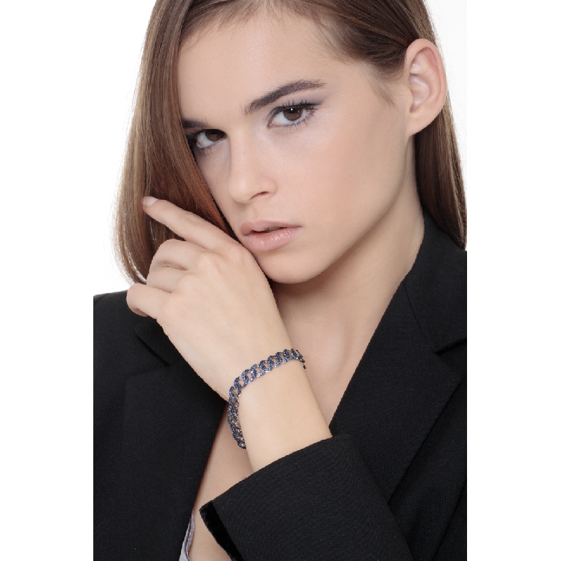 Bracelet gourmette en or blanc 18K avec saphirs bleus Bracelet gourmette en or blanc 18K avec saphirs bleus