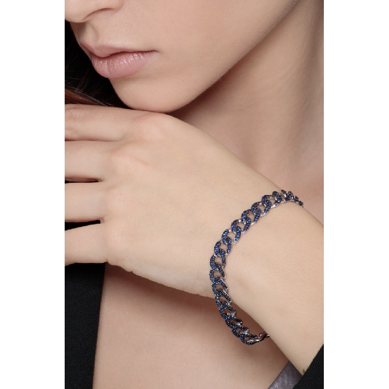 Bracelet gourmette en or blanc 18K avec saphirs bleus Bracelet gourmette en or blanc 18K avec saphirs bleus