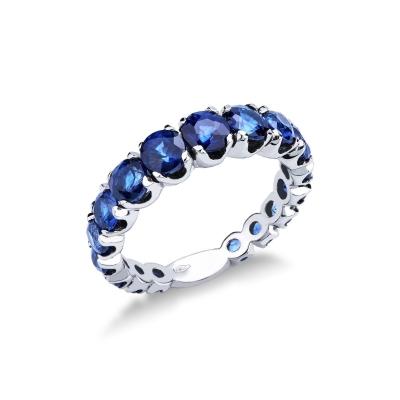 Bague demi-alliance en or blanc 18k avec saphirs bleus