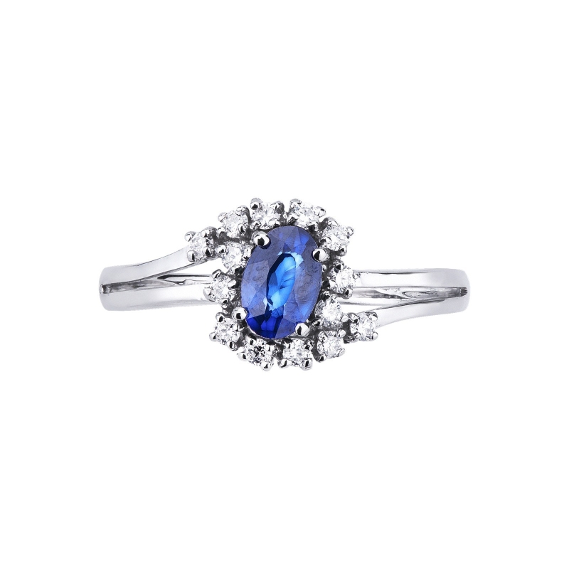 Bague avec diamants et saphir bleu ovale central en or blanc 18k Bague avec diamants et saphir bleu ovale central en or blanc 18k