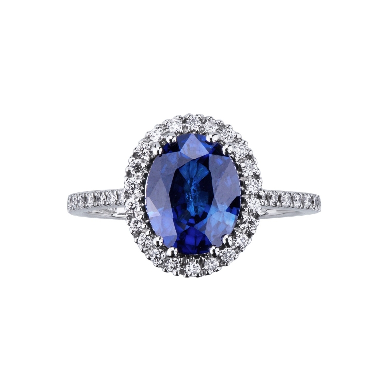 Bague en or blanc avec saphir bleu ovale et diamants Bague en or blanc avec saphir bleu ovale et diamants