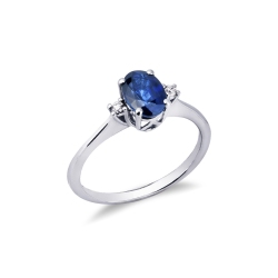 Bague en or blanc 18k avec saphir bleu ovale et diamants