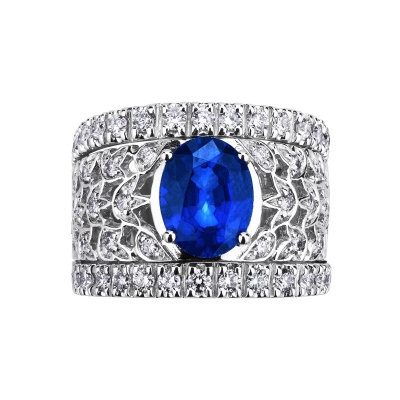 Bague bandeau en or blanc 18k avec saphir bleu et diamants