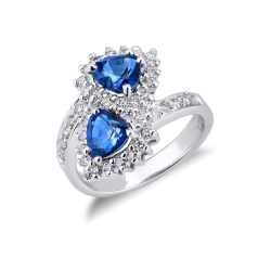 Bague contrarié en or blanc avec saphirs cœur et diamants