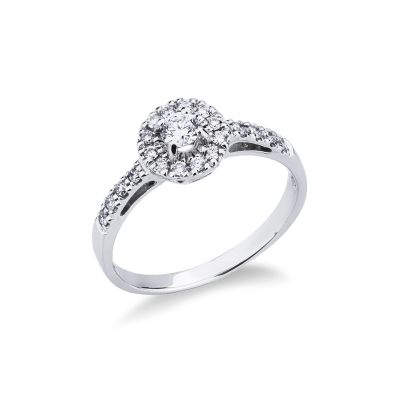 Bague en or blanc 18k avec diamant central et pavé