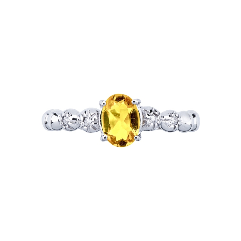 Bague en or blanc 18 carats avec un citrine et 2 diamants  Bague en or blanc 18 carats avec un citrine et 2 diamants