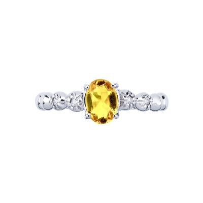 Bague en or blanc 18 carats avec un citrine et 2 diamants 