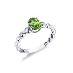 Bague en or blanc 18 carats avec un péridot et 2 diamants