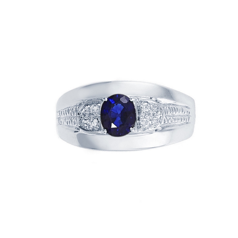 Bague en or blanc 18k avec saphir bleu et diamants Bague en or blanc 18k avec saphir bleu et diamants