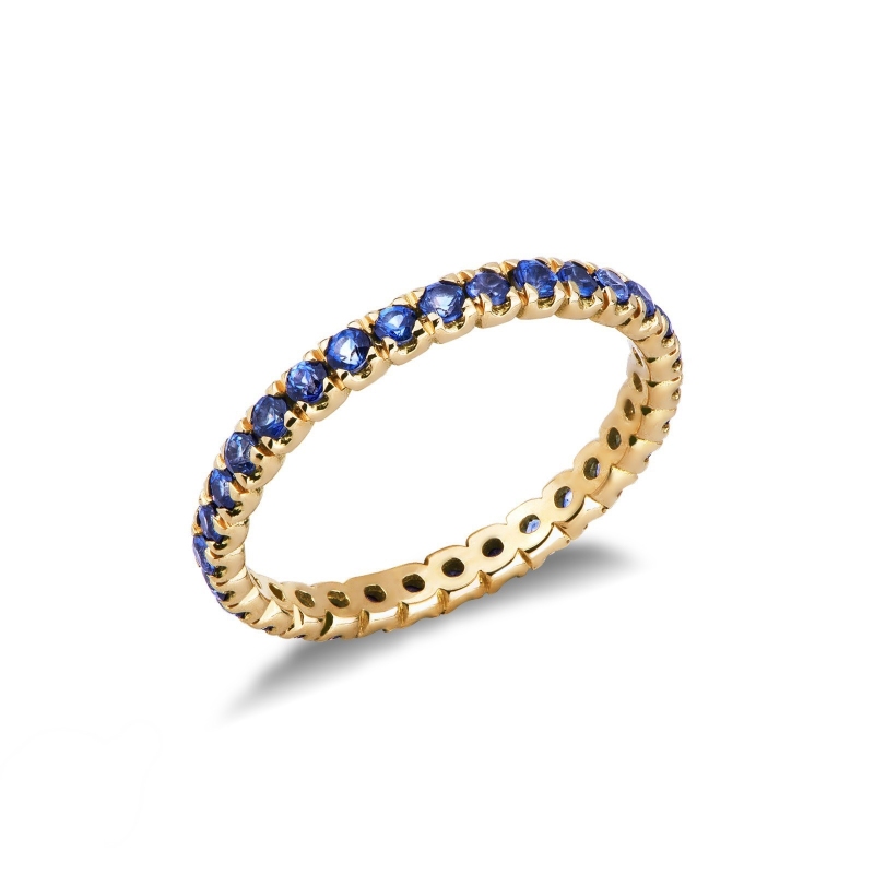 Bague d’éternité à griffes en Or Jaune 18k et saphirs blue
