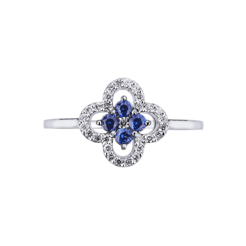 Bague en or blanc 18k en forme de fleur avec saphirs bleu  Bague en or blanc 18k en forme de fleur avec saphirs bleu