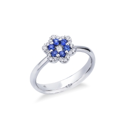 Bague en or blanc 18k avec fleur de diamants et saphir bleu