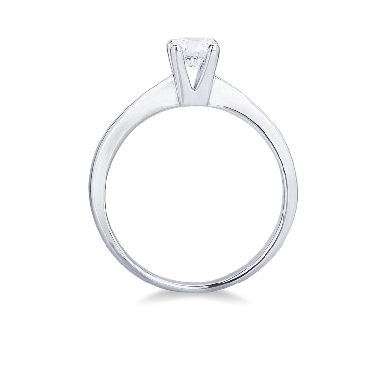 Bague solitaire en or blanc 18k à quatre griffes ct. 0,40  Bague solitaire en or blanc 18k à quatre griffes ct. 0,40