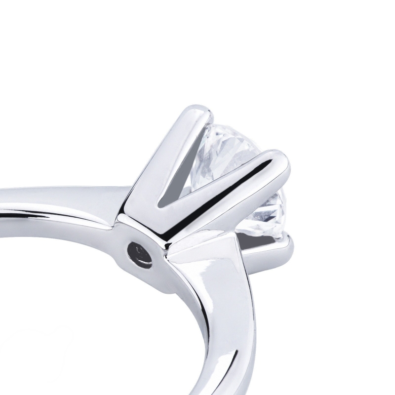 Bague solitaire diamant 0,70 ct or blanc 18k quatre griffes