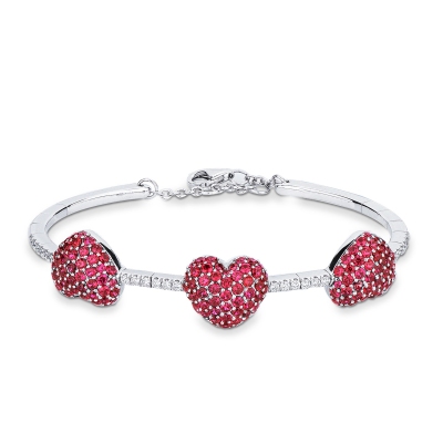 Bracelet en or blanc et diamants avec trois cœurs en rubis