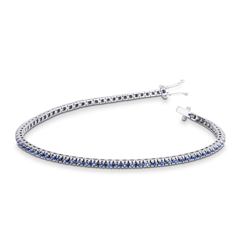Bracelet tennis or blanc 18k avec saphirs bleus