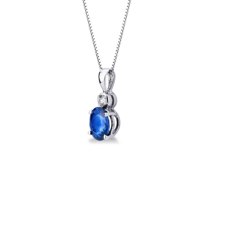 Chaîne en or blanc 18k avec diamant et saphir bleu