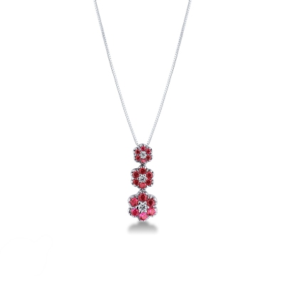 Collier trilogie en or blanc 18k avec trois fleurs avec rubis