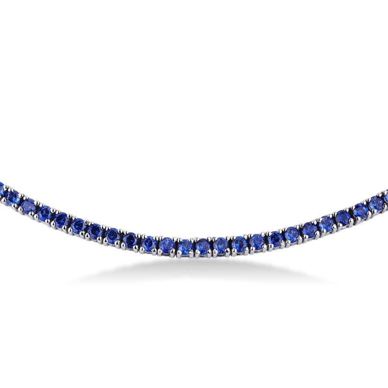 Collier tennis en or blanc 18 carats avec des saphirs bleus  Collier tennis en or blanc 18 carats avec des saphirs bleus