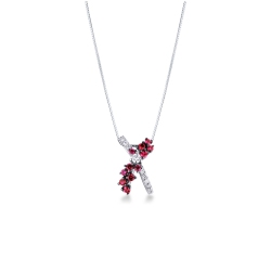 Collier en or blanc 18 carats croisé orné de rubis et diamants