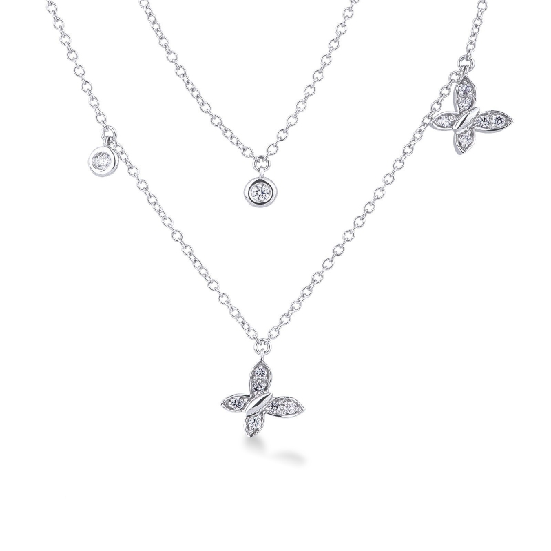 Collier double rang avec pendentifs et papillon en diamants or 750