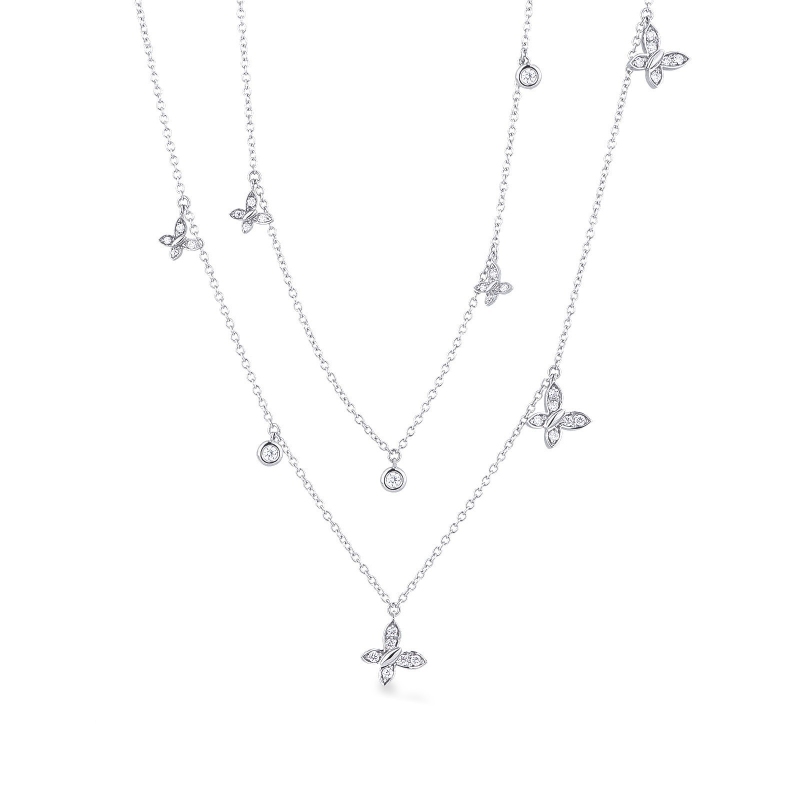 Collier double rang avec pendentifs et papillon en diamants or 750